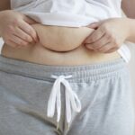 Barriguinha Persistente? Ciência Explica Por Que a Gordura Teimosa Não Te Larga